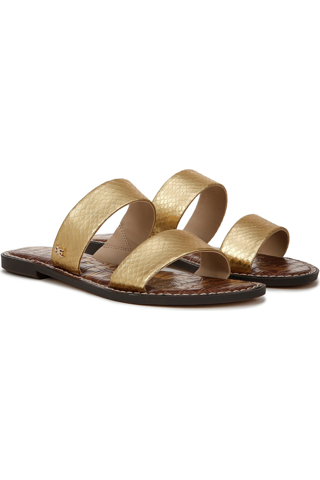 A pair of women's flat slide sandals with textured metallic gold straps and a brown footbed, shown on a plain white background.