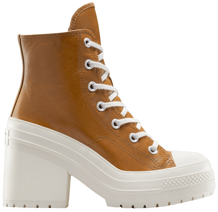 A high-top platform sneaker boot in tan leather with white laces, a thick white platform sole, and a chunky white block heel, shown from a side profile on a white background.