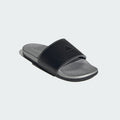 A single slide sandal with a textured black upper strap and a gray footbed, shown from a three-quarters perspective on a light gray background.
