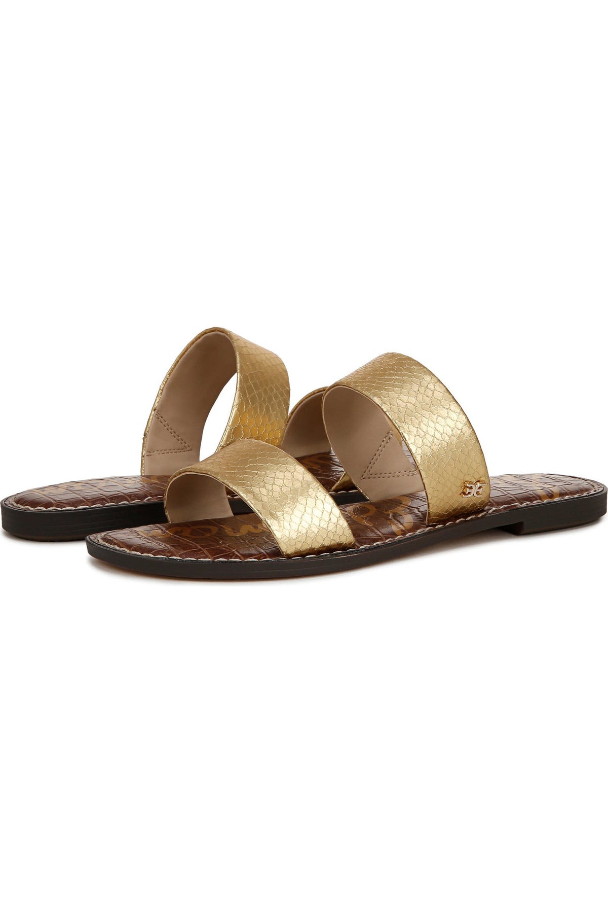 A pair of women's flat slide sandals featuring textured metallic gold straps and a dark brown crocodile-embossed footbed, shown against a plain white background.