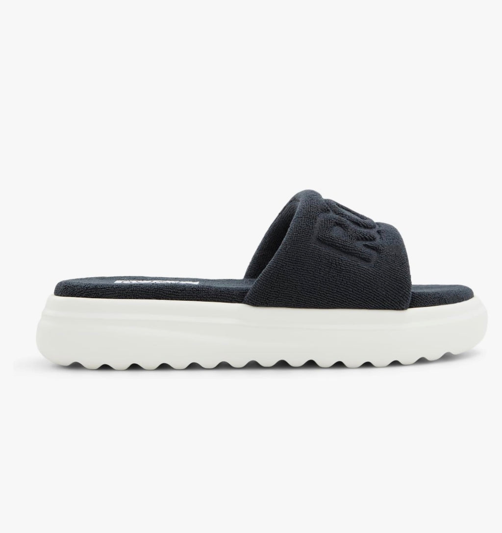 Black slide sandal with brand logo on a white background